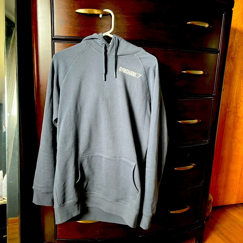 GYMSHARK mens hoodie in size L in a grayish blue color.